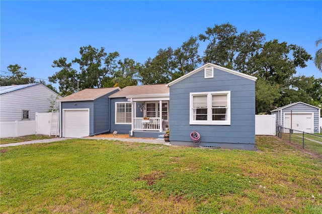 4012 N Munro St, Tampa, FL 33603 - view of front facade featuring a porch, an attached garage, and a shingled roof