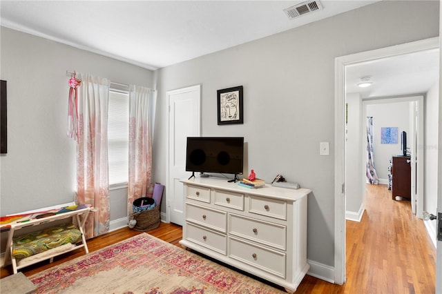 4012 N Munro St, Tampa, FL 33603 - bedroom featuring light wood-style floors and baseboards