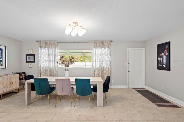 4012 N Munro St, Tampa, FL 33603 - dining space with a textured ceiling and light tile patterned flooring
