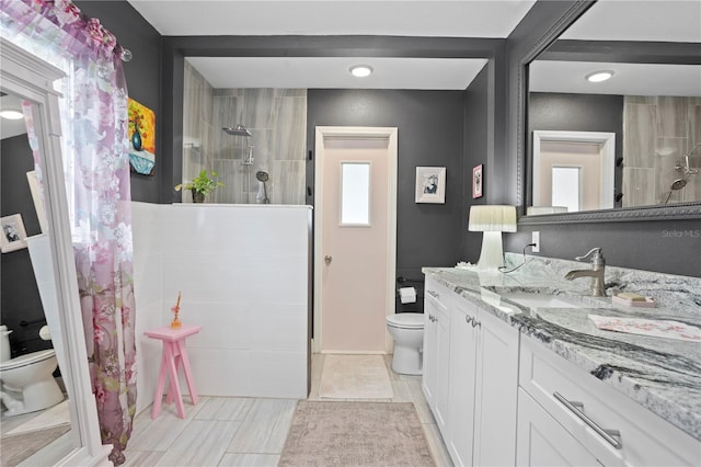 4012 N Munro St, Tampa, FL 33603 - full bathroom featuring a walk in shower, vanity, recessed lighting, and tile patterned flooring