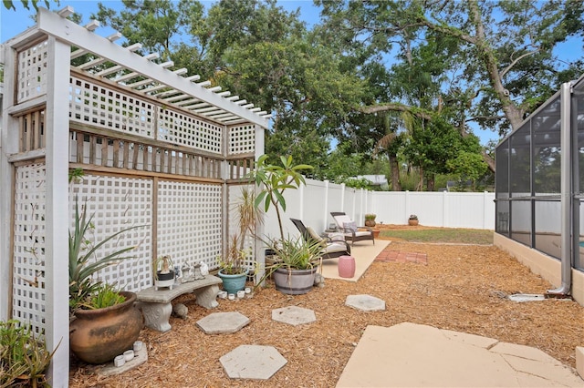 4012 N Munro St, Tampa, FL 33603 - fenced backyard with a lanai and a patio area