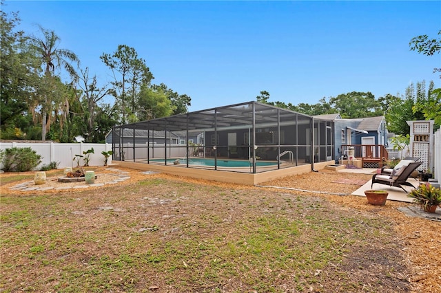 4012 N Munro St, Tampa, FL 33603 - fenced backyard featuring a lanai and a patio