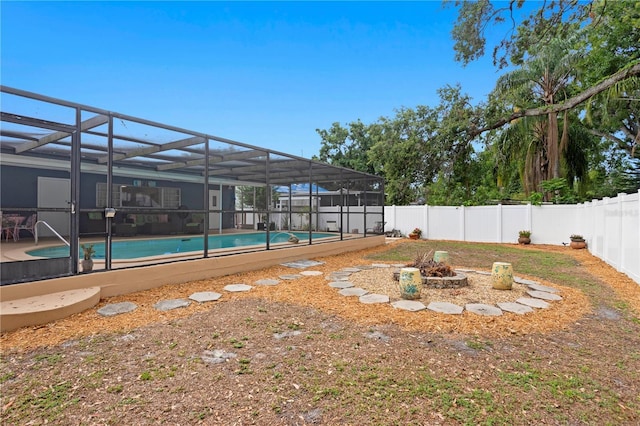 4012 N Munro St, Tampa, FL 33603 - fenced backyard with a fire pit