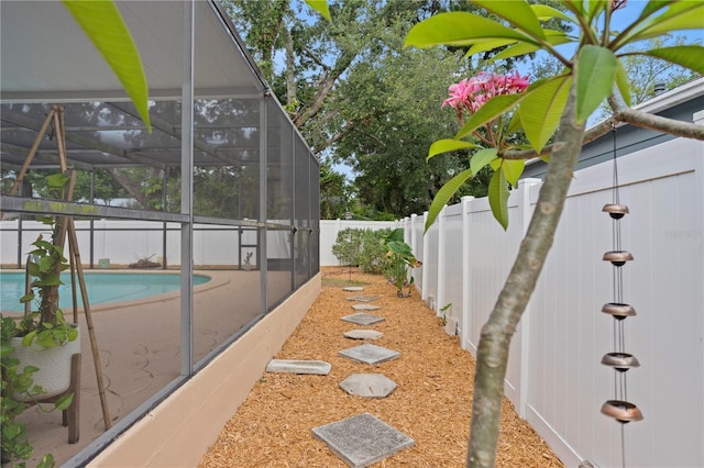 4012 N Munro St, Tampa, FL 33603 - view of swimming pool featuring a fenced backyard and glass enclosure