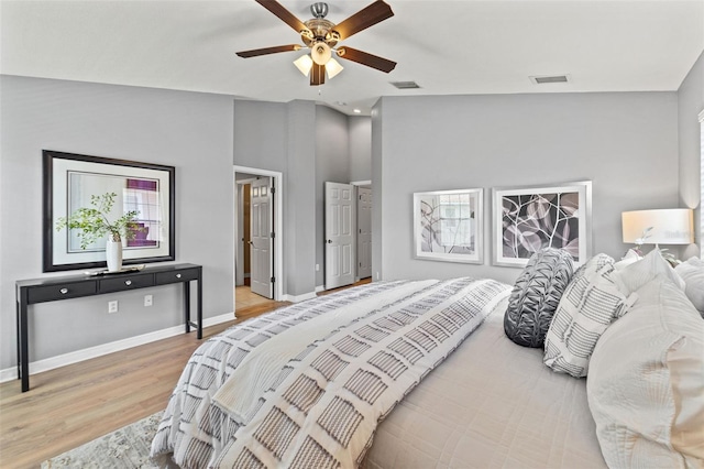 589 52nd Ave N, Saint Petersburg, FL 33703 - bedroom featuring light wood-type flooring, baseboards, and a ceiling fan