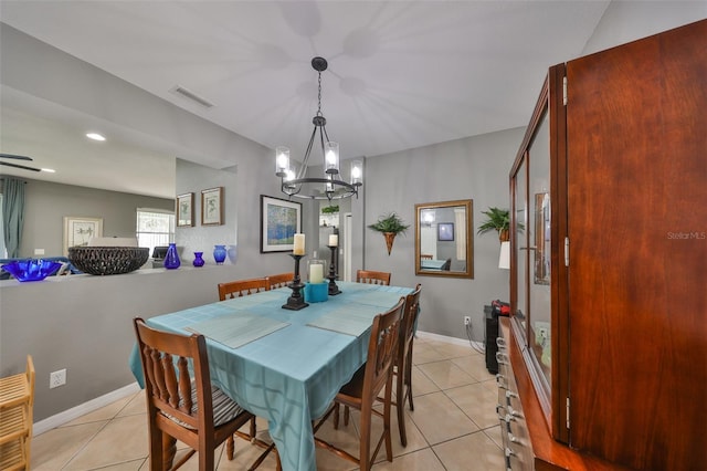 11806 Holly Crest Ln, Riverview, FL 33569 - dining room featuring a chandelier, light tile patterned flooring, recessed lighting, and baseboards