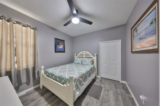 11806 Holly Crest Ln, Riverview, FL 33569 - bedroom featuring wood finished floors, baseboards, and ceiling fan