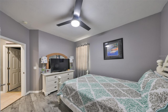 11806 Holly Crest Ln, Riverview, FL 33569 - bedroom with light wood-type flooring, ceiling fan, and baseboards