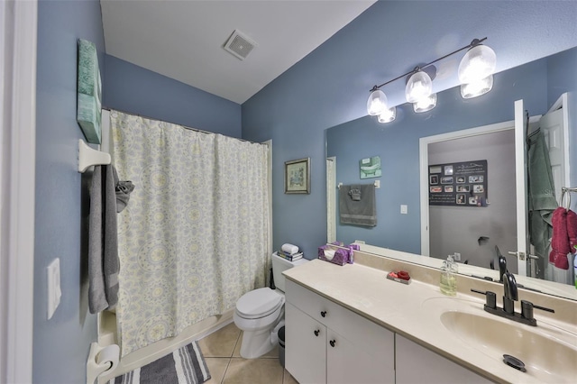 11806 Holly Crest Ln, Riverview, FL 33569 - bathroom featuring tile patterned floors, vanity, toilet, and shower / bathtub combination with curtain