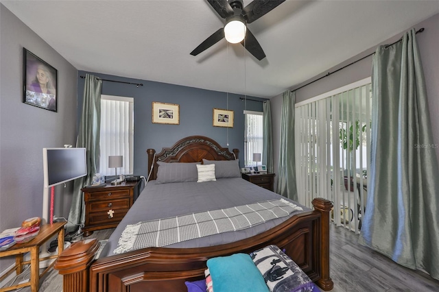 11806 Holly Crest Ln, Riverview, FL 33569 - bedroom featuring wood finished floors and a ceiling fan