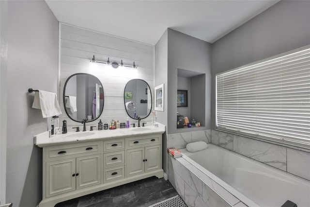 11806 Holly Crest Ln, Riverview, FL 33569 - bathroom featuring a bath and double vanity
