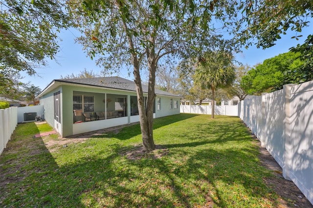 11806 Holly Crest Ln, Riverview, FL 33569 - back of house featuring a sunroom and stucco siding