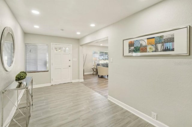 3118 Adrian Ave, Largo, FL 33774 - foyer entrance featuring baseboards, wood finished floors, and recessed lighting
