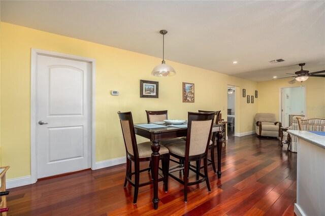 460 Meravan Dr, Palm Harbor, FL 34683 - dining area with dark wood-style flooring, baseboards, ceiling fan, and recessed lighting
