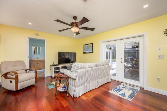 460 Meravan Dr, Palm Harbor, FL 34683 - living area featuring french doors, wood finished floors, a ceiling fan, baseboards, and recessed lighting