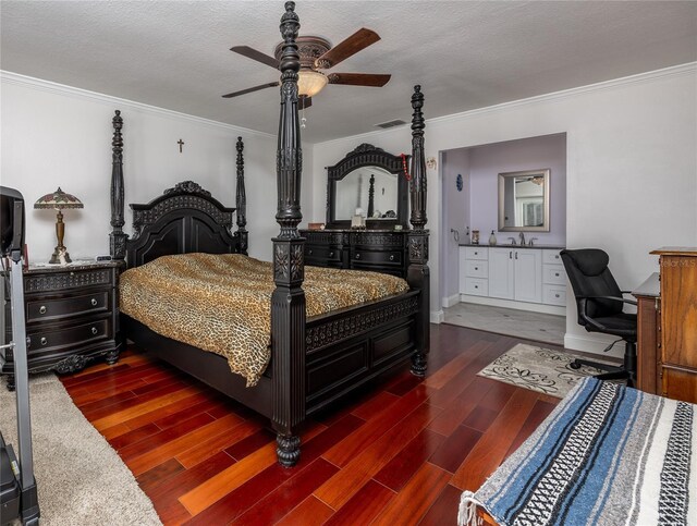460 Meravan Dr, Palm Harbor, FL 34683 - bedroom with ornamental molding, wood finished floors, a sink, ceiling fan, and a desk