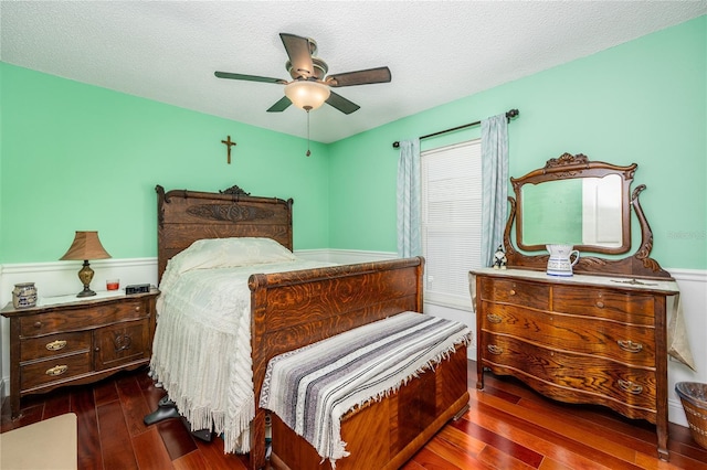 460 Meravan Dr, Palm Harbor, FL 34683 - bedroom with hardwood / wood-style flooring, ceiling fan, and a textured ceiling