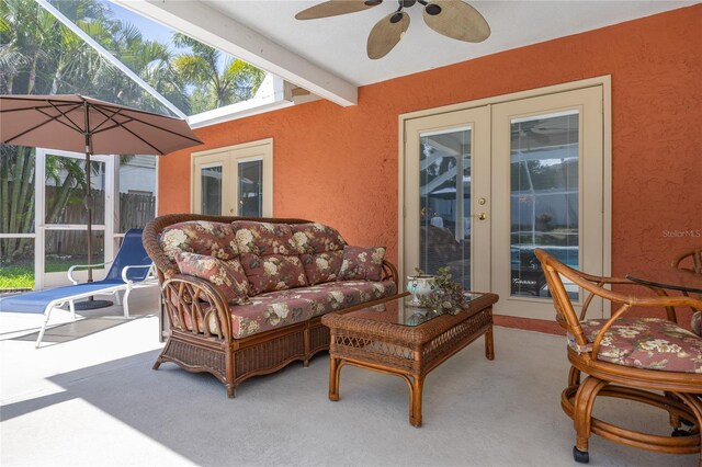 460 Meravan Dr, Palm Harbor, FL 34683 - sunroom / solarium featuring french doors and beam ceiling