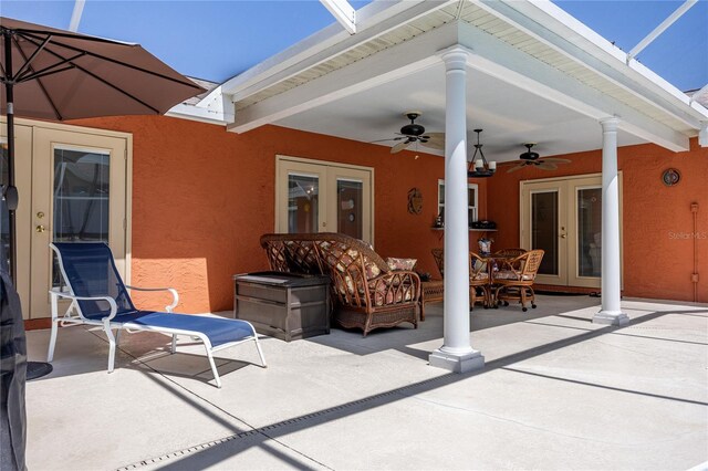460 Meravan Dr, Palm Harbor, FL 34683 - view of patio / terrace featuring french doors and a ceiling fan