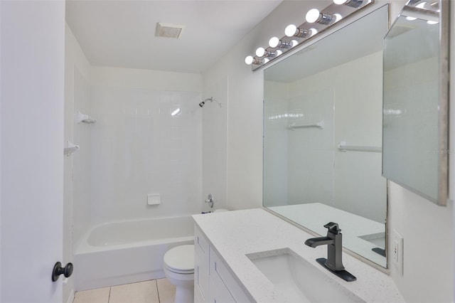 10414 Hallmark Blvd, Riverview, FL 33578 - bathroom with vanity, toilet, tile patterned floors, and washtub / shower combination