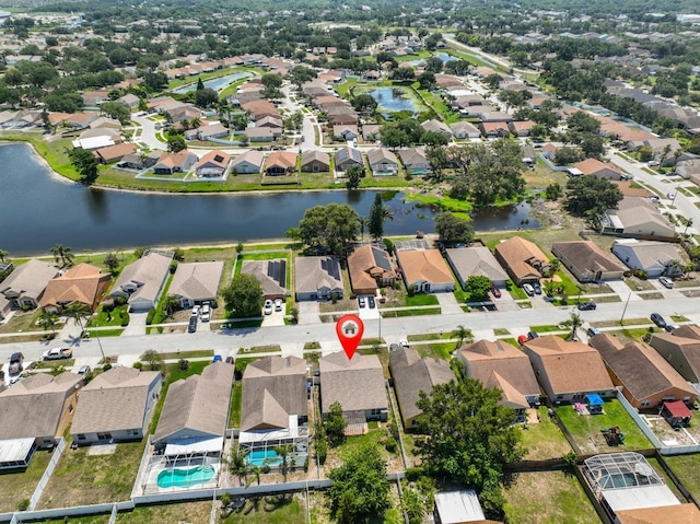 10414 Hallmark Blvd, Riverview, FL 33578 - aerial view of property's location featuring nearby suburban area, a large body of water, and a pool