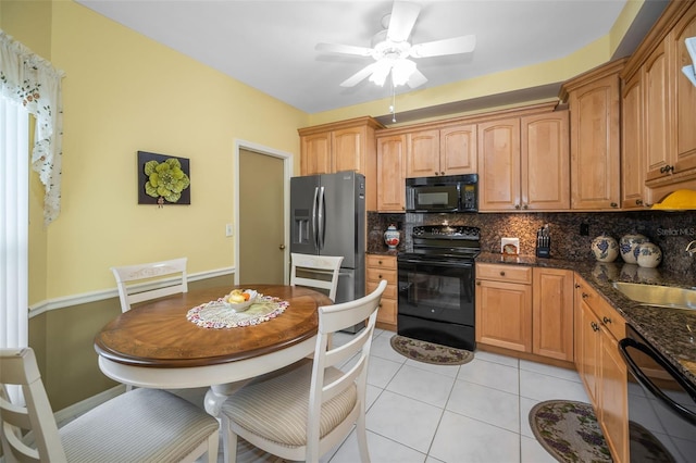184 Hunter Ct, Palm Harbor, FL 34684 - kitchen featuring black appliances, tasteful backsplash, a sink, ceiling fan, and light tile patterned floors