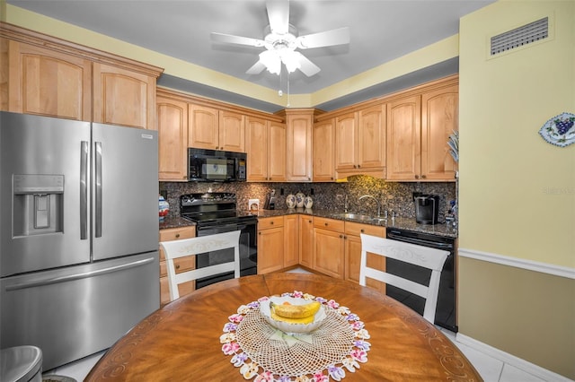 184 Hunter Ct, Palm Harbor, FL 34684 - kitchen with black appliances, a sink, backsplash, ceiling fan, and baseboards