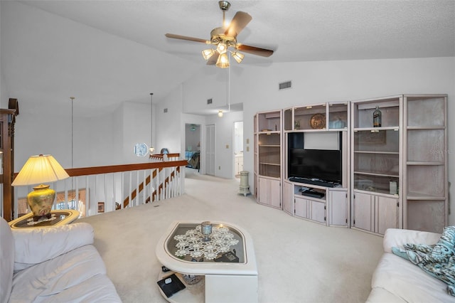 184 Hunter Ct, Palm Harbor, FL 34684 - living area featuring a ceiling fan, carpet flooring, and lofted ceiling