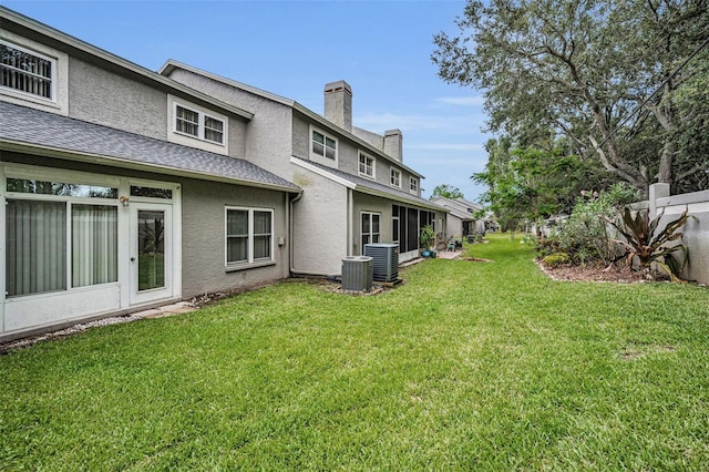 184 Hunter Ct, Palm Harbor, FL 34684 - view of green lawn with cooling unit