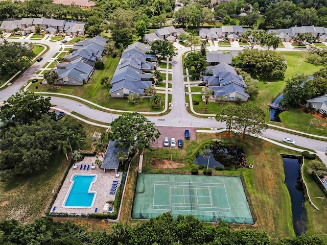 184 Hunter Ct, Palm Harbor, FL 34684 - aerial view of property's location featuring nearby suburban area, a nearby body of water, and a pool
