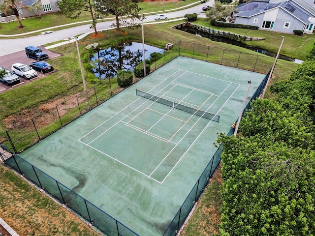 184 Hunter Ct, Palm Harbor, FL 34684 - view of tennis court with a water view