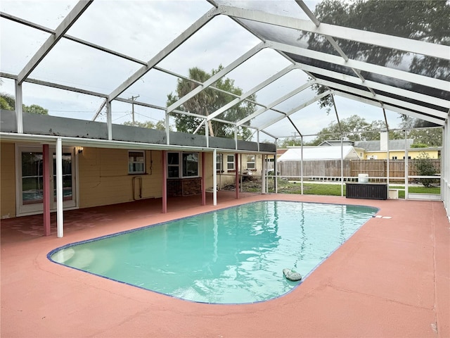 2523 Krueger Ln, Tampa, FL 33618 - view of swimming pool featuring a patio and glass enclosure