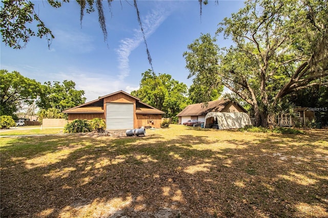 309 Hidden Lake Dr, Brandon, FL 33511 - view of yard featuring a garage and an outdoor structure
