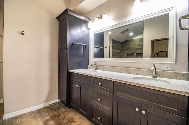 309 Hidden Lake Dr, Brandon, FL 33511 - full bath featuring double vanity and wood finished floors