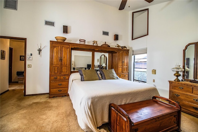 309 Hidden Lake Dr, Brandon, FL 33511 - bedroom featuring high vaulted ceiling, light colored carpet, and a ceiling fan