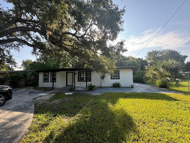 1109 N Obrien St, Tampa, FL 33607 - ranch-style home with stucco siding and a porch
