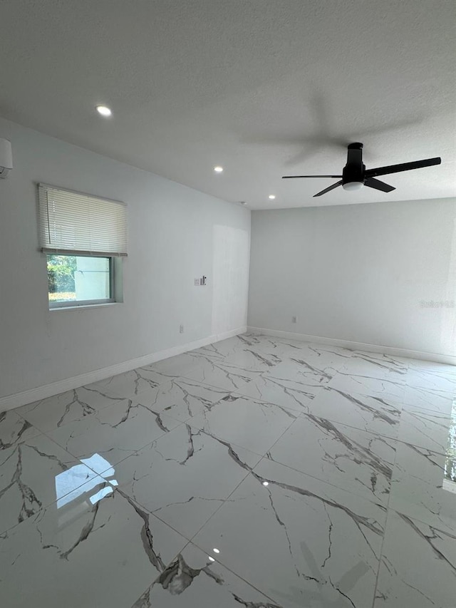 1109 N Obrien St, Tampa, FL 33607 - unfurnished room with baseboards, recessed lighting, a ceiling fan, and marble look tiles
