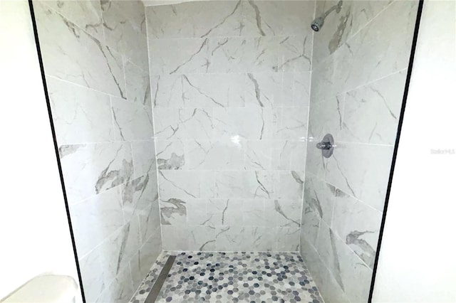 1109 N Obrien St, Tampa, FL 33607 - full bath featuring a tile shower and toilet