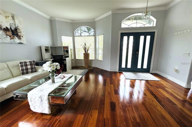 1842 Ridgelake Ct, Wesley Chapel, FL 33543 - foyer with wood finished floors, crown molding, and baseboards