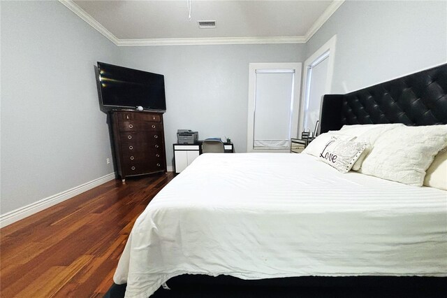 1842 Ridgelake Ct, Wesley Chapel, FL 33543 - bedroom featuring wood finished floors, crown molding, and baseboards