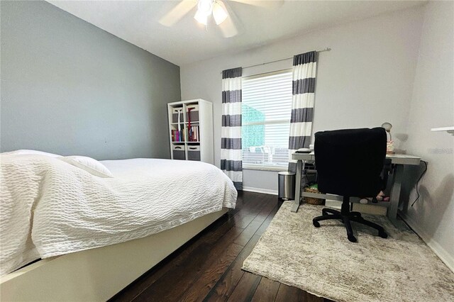 1842 Ridgelake Ct, Wesley Chapel, FL 33543 - bedroom with dark wood-style flooring, baseboards, a ceiling fan, and an office area