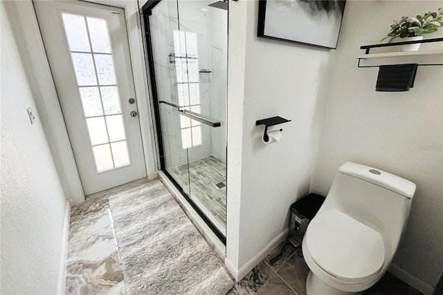 1842 Ridgelake Ct, Wesley Chapel, FL 33543 - bathroom featuring marble look tiles, a stall shower, toilet, and plenty of natural light