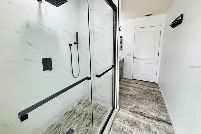 1842 Ridgelake Ct, Wesley Chapel, FL 33543 - bathroom with a marble finish shower, marble finish flooring, baseboards, and vanity