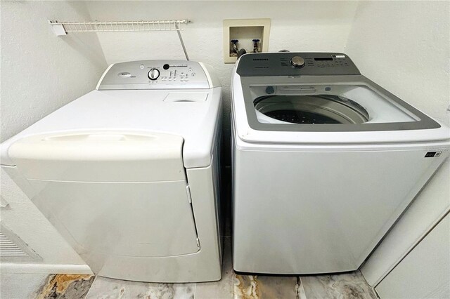 1842 Ridgelake Ct, Wesley Chapel, FL 33543 - laundry room featuring washing machine and clothes dryer