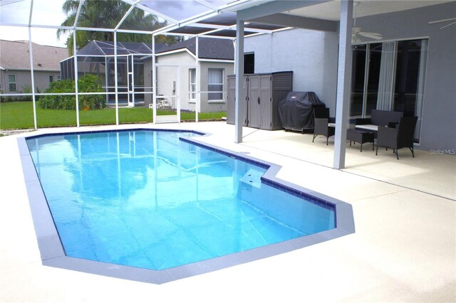 1842 Ridgelake Ct, Wesley Chapel, FL 33543 - outdoor pool with a patio area, a grill, ceiling fan, and a lanai