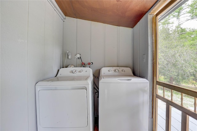 5290 Cyril Dr, Dade City, FL 33523 - laundry area featuring washing machine and clothes dryer and plenty of natural light