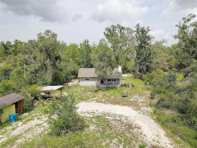 5290 Cyril Dr, Dade City, FL 33523 - aerial view of property and surrounding area with a forest
