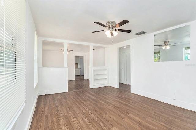 3008 E Wilder Ave, Tampa, FL 33610 - unfurnished living room with a ceiling fan and wood finished floors
