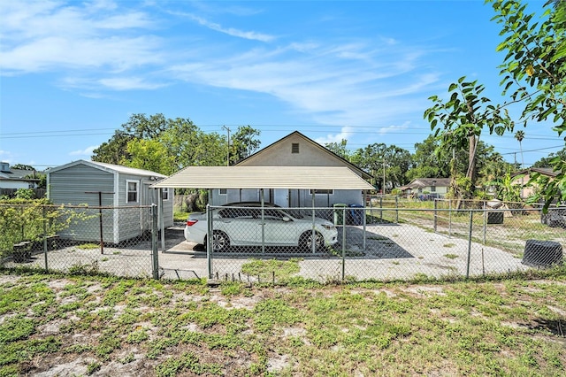 3008 E Wilder Ave, Tampa, FL 33610 - view of parking / parking lot featuring a detached carport