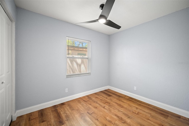2809 Marconi St, Tampa, FL 33605 - unfurnished bedroom featuring a closet, wood finished floors, baseboards, and ceiling fan